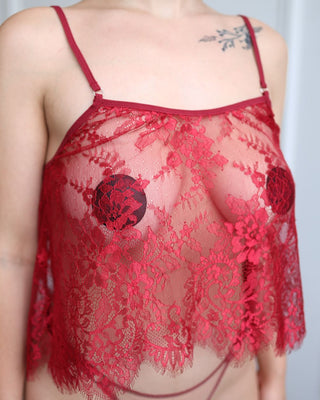 Close-up of burgundy sheer lace top – delicate Chantilly lace details